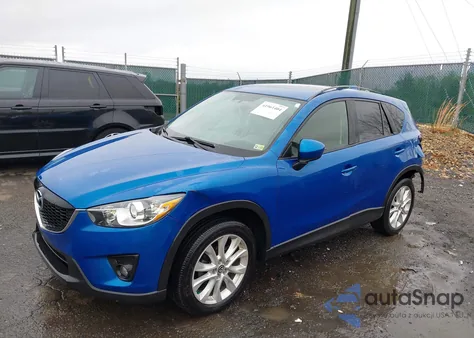 2013 Mazda Cx-5 Grand Touring z USA, uszkodzony, nr VIN JM3KE4DE0D0139257